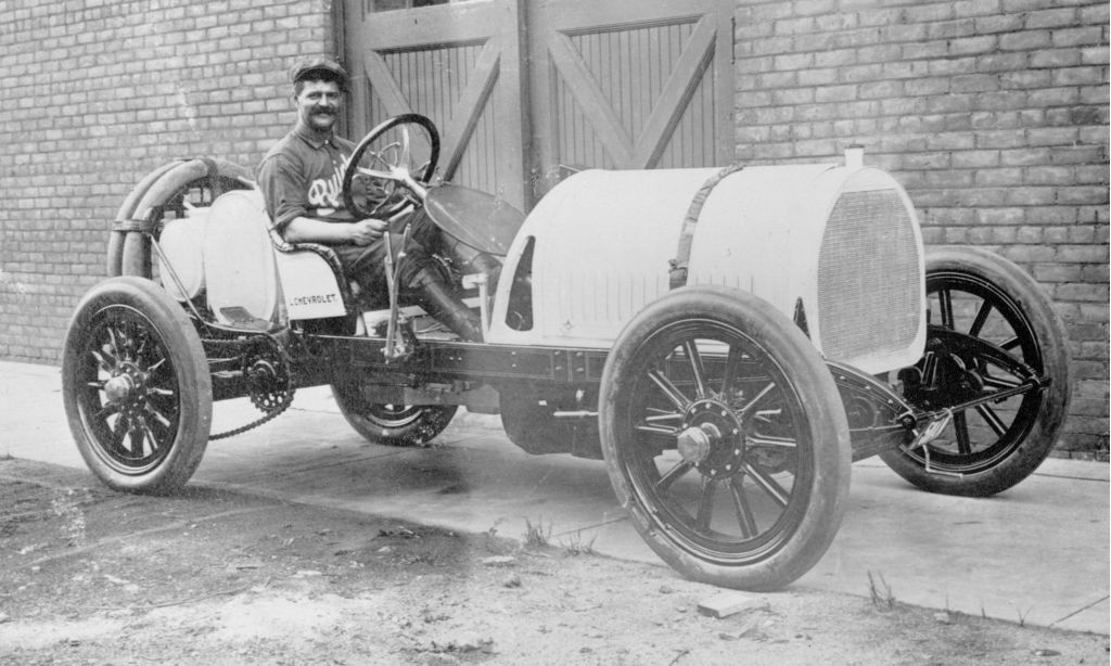 Louis-Joseph Chevrolet behind the wheel of a Buick at the factory in Flint, Michigan, 1911