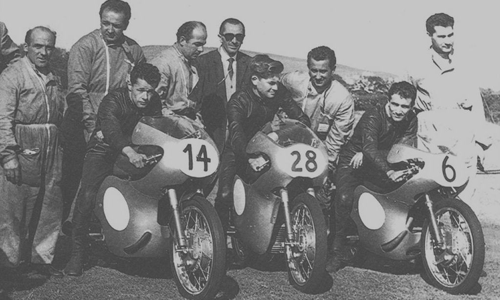 Ducati at the Tourist Trophy 1958 with Luigi Taveri, Sammy Miller, Romolo Ferri, Ing. Taglioni & Renato Armaroli